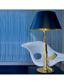 Gun table lamp Flos gold or black color in living room